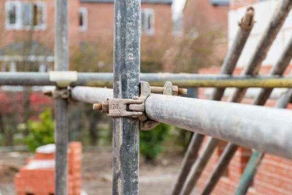 Ensure a party wall agreement is in place before Damage to Property Esher happens.